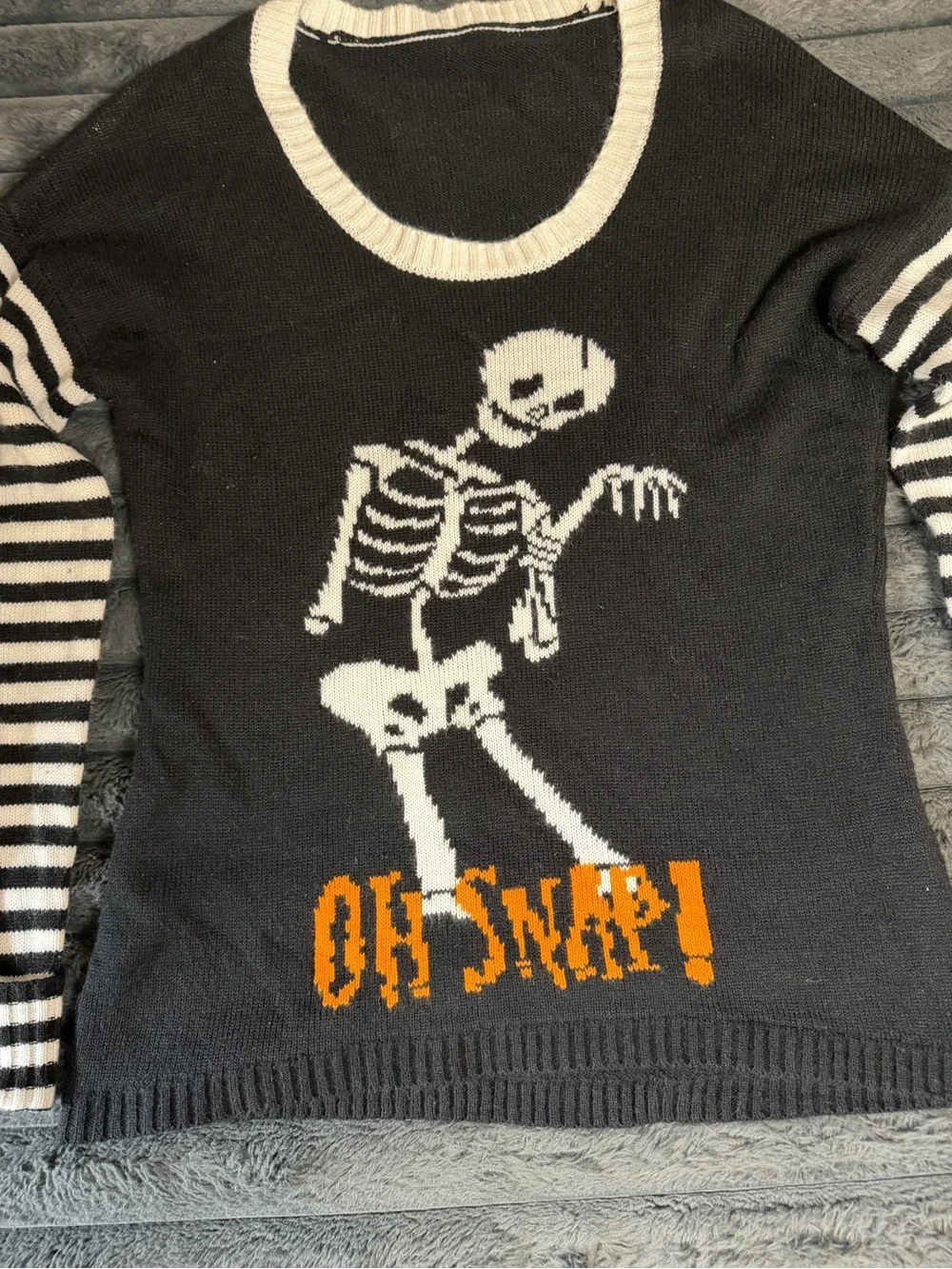 Black & White Skeletal Graphic Crewneck Sweater with Orange Accent